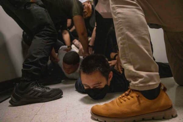 Photo: A Dominican man, on the left, and an activist, on the right, are arrested by simple clothing officers with ice agents after an immigration audience in the Federal Building Jacob K. Javitz in New York, June 6, 2025.